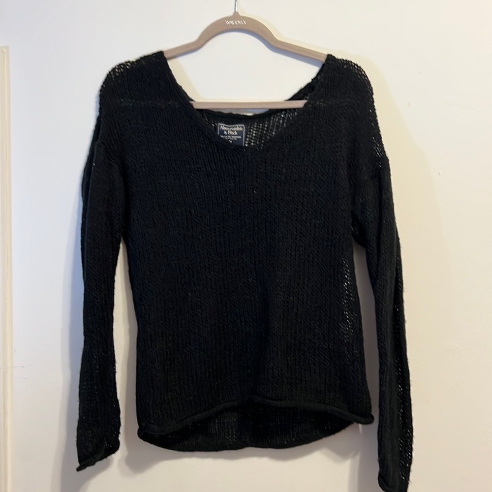 A black sheer sweater